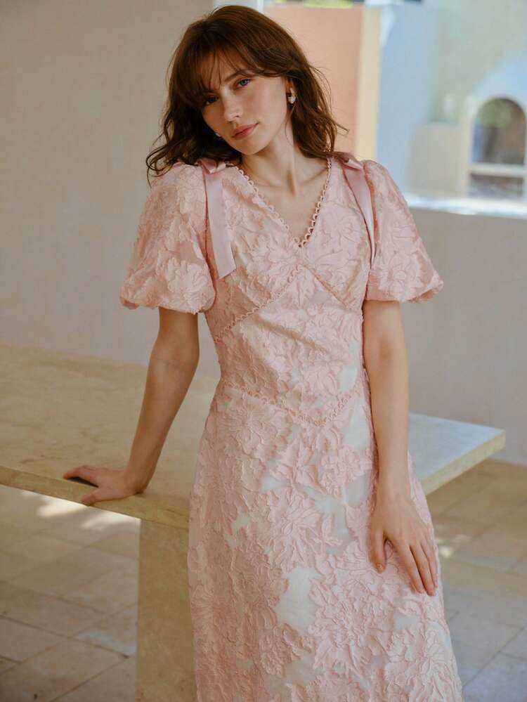 VESTIDO MIDI DE PUNTO JACQUARD CON CUELLO EN V Y LAZO