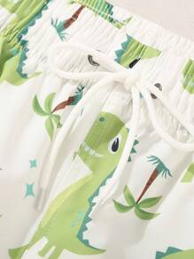 Manfinity Swimmode Pantalones cortos de playa con estampado de dinosaurio para hombres, estilo de vacaciones y playa