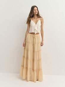 Nöista Falda larga sólida con nudo y volantes, inspirada en el estilo vintage para primavera y verano casual, perfecta para la moda femenina.