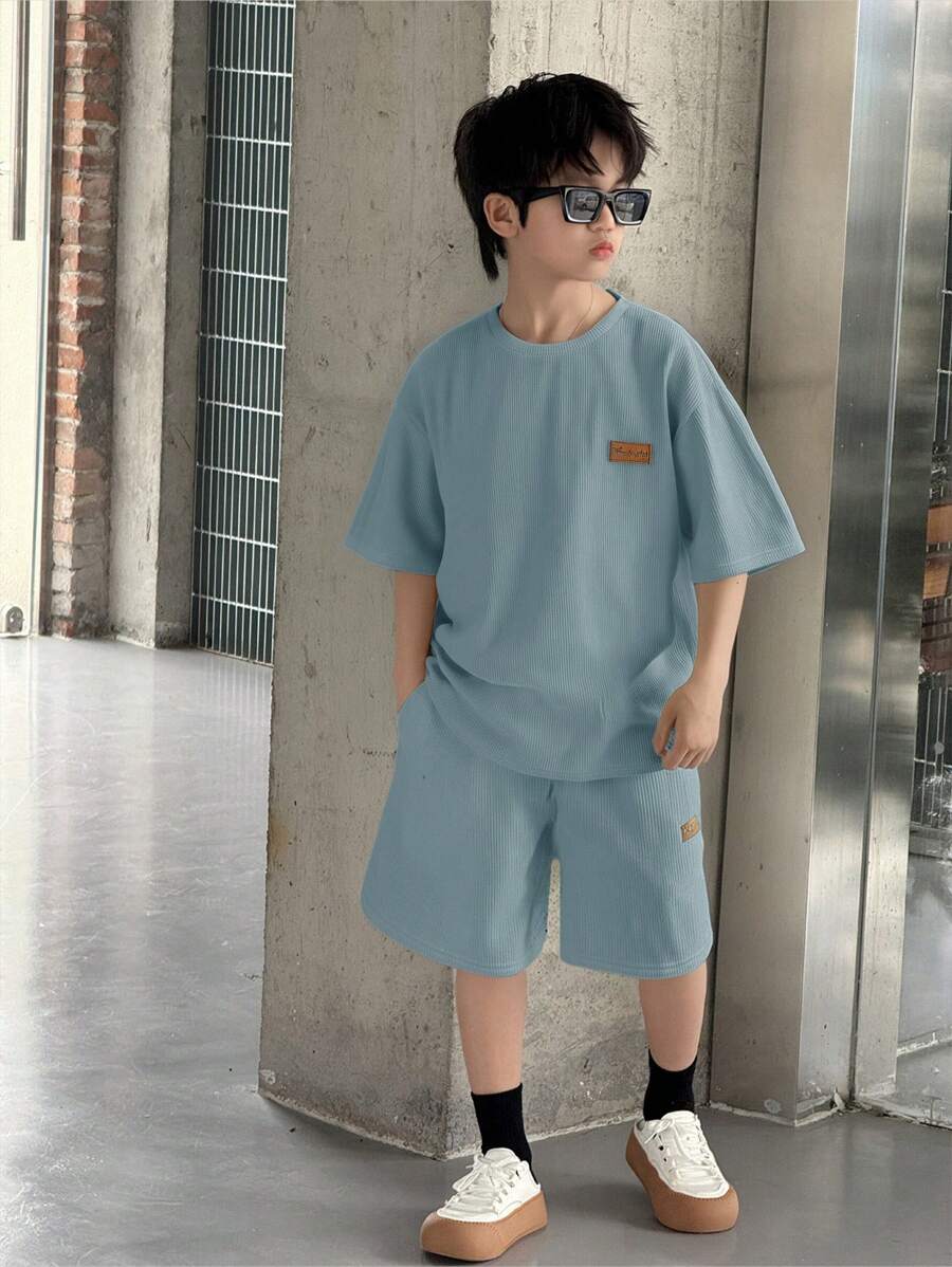 SHEIN 2pcs Tween Boys' Casual Korean White Solid Loose Knit Textured Soft Fabric College Style Round Neck Short Sleeve T-Shirt And Shorts Set, Suitable For Spring/Summer, College, Home, Daily Wear, Sports, Birthday Party, Outings, Basic & Minimalist Boy Casual Sets