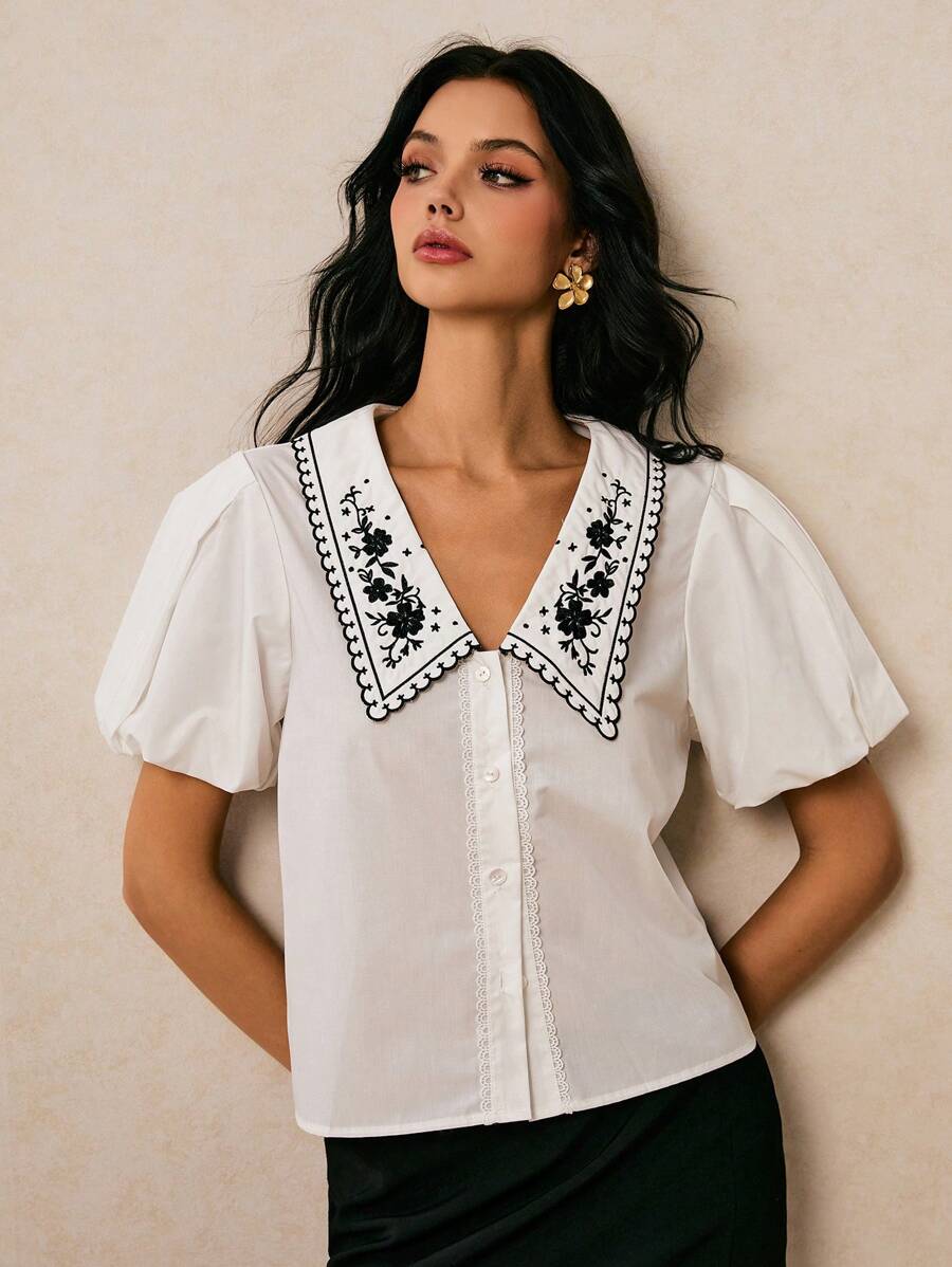 Poéselle Áo cánh đơn giản thêu hoa tay bồng ngắn cho nữ ngày lễ - trắng - Xem 1