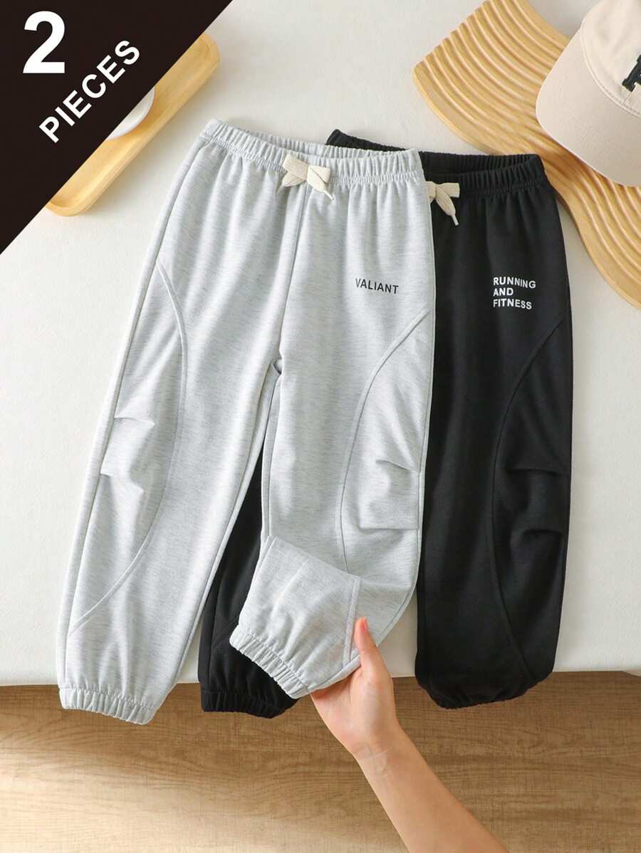 2 szt. Chłopięce sportowe spodnie w stylu Split plisowany design ze sztucznym ściągaczem, ozdobne litery, długie, odpowiednie do codziennego noszenia, szkoły, sportu, wiosny/lata/jesieni