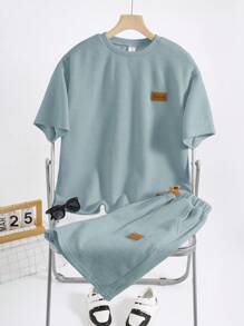 SHEIN 2pcs Tween Boys' Casual Korean White Solid Loose Knit Textured Soft Fabric College Style Round Neck Short Sleeve T-Shirt And Shorts Set, Suitable For Spring/Summer, College, Home, Daily Wear, Sports, Birthday Party, Outings, Basic & Minimalist Boy Casual Sets