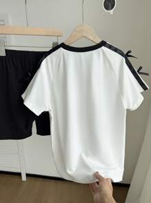 SHEIN 2 件套青少年女孩休闲百搭美式学院风，蝴蝶结装饰节日主题，黑白拼接宽松短袖蝴蝶结印花 T 恤和黑色紧身短裤，适合上学、郊游、度假、春夏季年轻女孩套装夏季