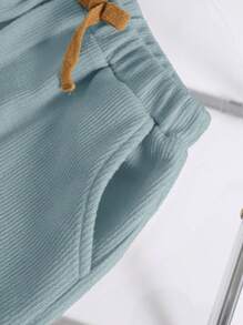 SHEIN 2pcs Tween Boys' Casual Korean White Solid Loose Knit Textured Soft Fabric College Style Round Neck Short Sleeve T-Shirt And Shorts Set, Suitable For Spring/Summer, College, Home, Daily Wear, Sports, Birthday Party, Outings, Basic & Minimalist Boy Casual Sets