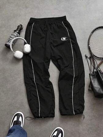Manfinity Sport Corelite Pantalones casuales de deporte para hombre con cintura de cordón y estampado de pentagrama. Ropa deportiva, pantalones para hacer ejercicio, pantalones para correr, transpirables para otoño