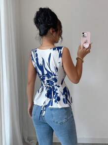 Rafferiza Fabric Printed Collarless Ruffle Tie Waist Sleeveless Women Blouse