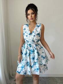 Chiquease Vestido corto sin mangas de mujer con estampado floral elegante, cintura con lazo cruzado y volantes en el bajo - Azul - Ver 1