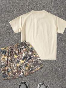 SHEIN Leap Crew 2pcs Tween Boy Beige Summer Casual City Break Street Style Graffiti Graphic Short Sleeve T-Shirt And Elastic Waist Utilitarian Shorts Set,Fashionable - Multicolor - View 2