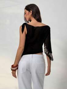 Aloruh Blouse en mousseline de soie transparente avec broderie florale, manches évasées, nœud papillon et épaules dénudées pour femmes, pour le printemps/été, style casual - Noir - Voir 2