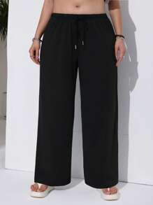 Calça de moletom plus size com amarração frontal e cor sólida simples e casual