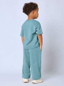 SUMWON 夏季运动套装，包含超大徽标印花 T 恤和抽绳长裤，运动休闲装