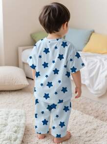 SHEIN Bộ đồ ngủ tay ngắn in hình ngôi sao năm cánh cho bé trai, dáng rộng, phù hợp cho mùa hè - Nhiều màu - Xem 2