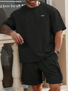 Manfinity Homme Conjunto de camiseta y pantalones cortos casuales para hombres talla grande, conjunto de dos piezas casuales de verano para hombres - Negro - Ver 1