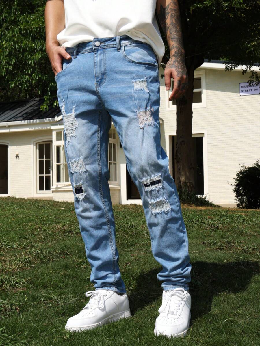 Manfinity Roughcore Jeans décontractés et délavés effilochés pour hommes - Jean clair - Voir 1