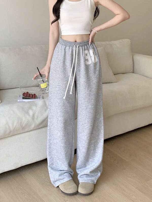 Pantalón de chándal de talle bajo gris claro para adolescentes, pantalón de chándal con estampado numérico casual, apropiado para todas las estaciones