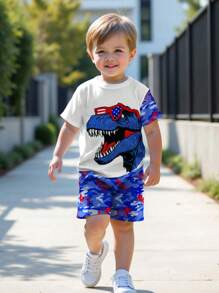SHEIN 2 件套年轻男孩休闲卡通恐龙图案圆领短袖 T 恤和短裤套装，适合夏季