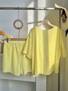 Comfortcana 2 件大码女士假日风格黄色短袖蝴蝶结上衣和短裤套装，适合春夏季
