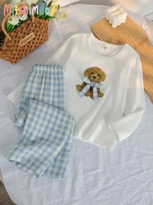 SHEIN Genkimix Kids 2 件套女孩卡通小狗与蝴蝶结印花针织长袖上衣和长裤睡衣套装