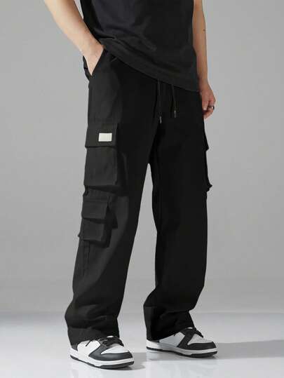 Manfinity EZcore بنطلون رجالي بخصر مطاطي وتصميم إبزيم، جيوب كارجو، بنطلون كاجوال فضفاض مستقيم، بقصة ساق فضفاضة مستقيمة. بنطلون فضفاض، ملابس الشارع، للسفر، للارتداء اليومي، للخريف