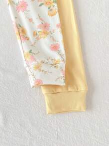 Set de 2 piezas para niñas pequeñas: Top de manga corta y ajustada, junto con pantalones estampados con flores, para un look casual y lindo para estar en casa