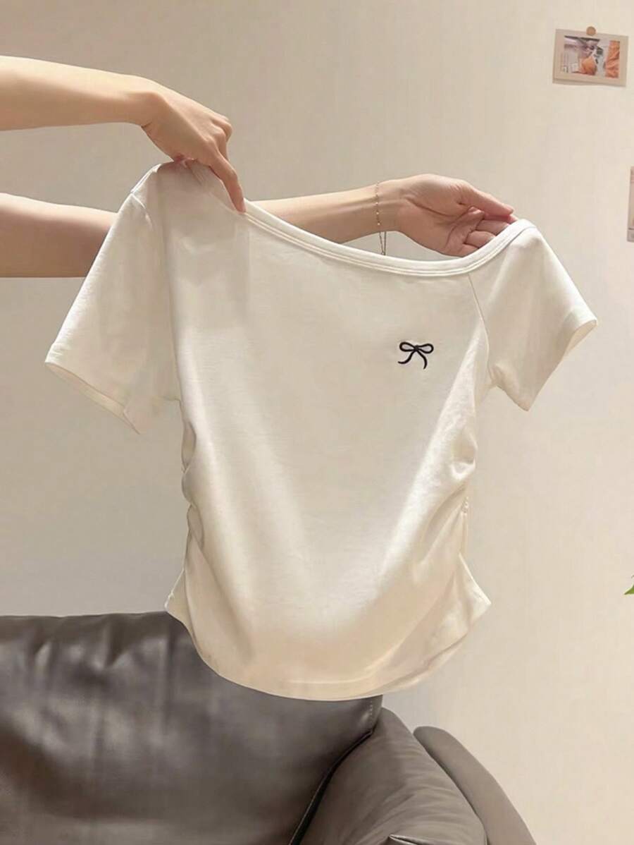 INAWLY Women's Summer New Sexy Asymmetric Neck Bowknot Embroidery Ruffle Slim Fit Revealing Shoulder T-Shirt - White - View 1