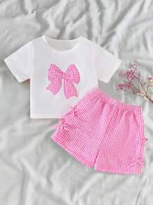 Conjunto informal de 2 piezas para niñas con camiseta de manga corta de cuello redondo a cuadros con lazo y shorts elásticos a la cintura con lazo a cuadros - Rosa - Ver 3