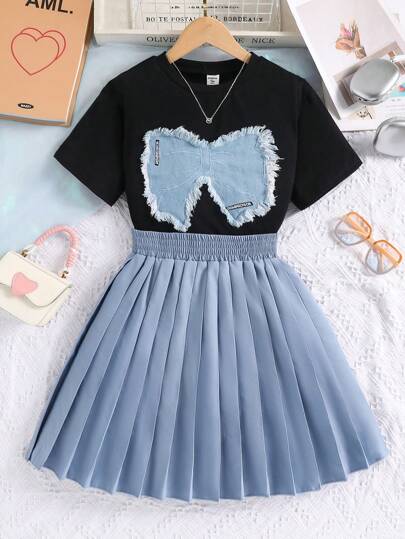 Sparklyn 2 件套青少年女孩圆领短袖 T 恤，带蝴蝶结图案和黑色褶皱迷你裙，夏季