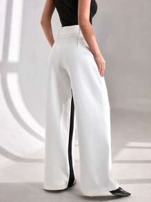 CLARA VERO Pantalón de pierna ancha con botones en la cintura alta, pantalón con paneles de contraste blancos, pantalón de bloques de color de diseñador, pantalón de pierna ancha de dos tonos elegante, pantalón de colección de ropa formal, colección de pierna ancha de alta moda, pantalón de ropa de noche sofisticada, pantalón de colección de diseñador de lujo, pantalón de declaración de uso profesional