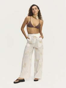 SHEIN Unity Quần ống rộng màu trắng với lớp vải mỏng nhẹ và kiểu dáng thoáng mát, lý tưởng khi kết hợp với áo crop top hoặc áo cánh nhẹ để tạo phong cách thời tiết ấm áp. - Màu be - Xem 5