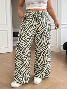 SHEIN EZwear Pantalones rectos informales de talla grande a rayas de cebra en blanco y negro