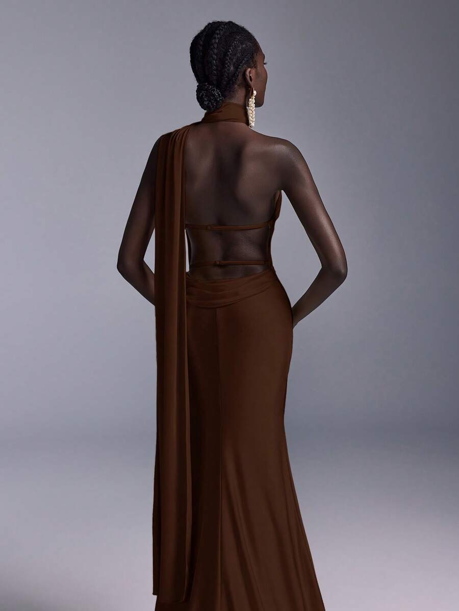 Elitara Elegant, Glamorous, And Stylish, This Coffee-Brown Knit Dress Features A Deep Backless Design, A Flowing Ribbon Neckline, And A Fitted Mermaid Silhouette With A Long Train. Suitable For Formal Occasions Such As Weddings, Cocktail Parties, Balls, And Elaborate Evening Gowns.