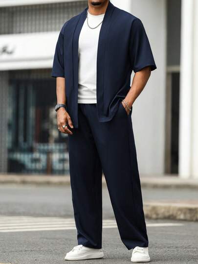 Manfinity CasualCool Plus Size Men's Shirt Set, Versatile & Slimming, Fashionable & Casual, Easy To Pull Off! This Deep Gray Short Sleeve Suit Set With A Simple White T-Shirt Underneath Showcases The Urban Man Style. The Loose Design Offers Comfort And Suitability For Various Casual Occasions. Pair With White Sneakers To Add A Vibrant, Dynamic Touch.