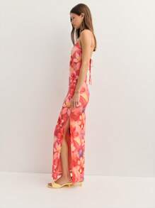 Nöista Sleeveless Dress Features A Square Neckline And Thin Straps, Crafted From A Soft, Semi-Sheer Fabric. Its Vivid Floral Pattern Adds Tropical Charm, Perfect For Summer Parties, Beach Vacations, Or Sunset Dinners. Bold Yet Effortlessly Elegant. 4th Of July Outfits - Red - View 4