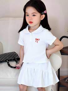 青少年女孩甜美休闲海军蓝领短袖刺绣蝴蝶结短款上衣和松紧腰短裙套装，夏季