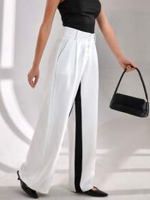 CLARA VERO Pantalón de pierna ancha con botones en la cintura alta, pantalón con paneles de contraste blancos, pantalón de bloques de color de diseñador, pantalón de pierna ancha de dos tonos elegante, pantalón de colección de ropa formal, colección de pierna ancha de alta moda, pantalón de ropa de noche sofisticada, pantalón de colección de diseñador de lujo, pantalón de declaración de uso profesional