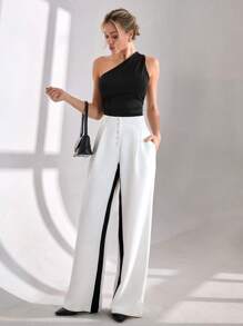 CLARA VERO Pantalón de pierna ancha con botones en la cintura alta, pantalón con paneles de contraste blancos, pantalón de bloques de color de diseñador, pantalón de pierna ancha de dos tonos elegante, pantalón de colección de ropa formal, colección de pierna ancha de alta moda, pantalón de ropa de noche sofisticada, pantalón de colección de diseñador de lujo, pantalón de declaración de uso profesional