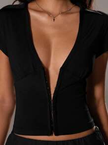 TRNVIE Camiseta de manga corta elegante de unicolor, ajustada y con cuello en V profundo con botones para mujer