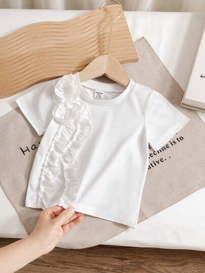 SHEIN 女婴白色针织面料短袖 T 恤，带有手工制作的圆形花朵精致的 3D 花卉装饰，适合外出和聚会，优雅百搭