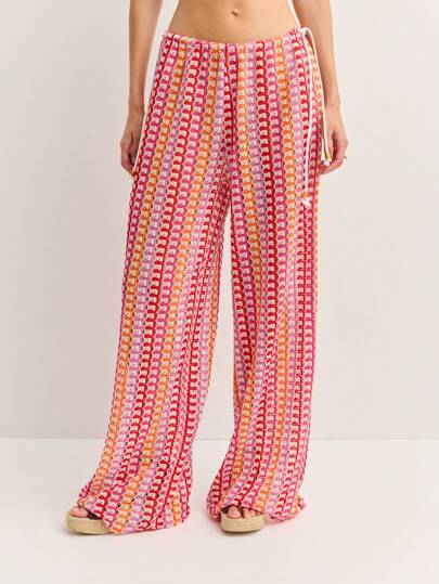 Nöista Wide-Leg Knit Crochet Pants Feature A Colorful Striped Pattern With Adjustable Drawstring Sides. Lightweight And Breezy, They're Perfect For Beach Cover-Ups, Summer Festivals, Or Relaxed Vacation Looks.