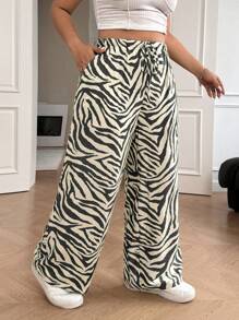 SHEIN EZwear Pantalones rectos informales de talla grande a rayas de cebra en blanco y negro
