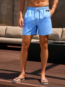 Surfspeed Men's Solid Color Drawstring Waist Pockets Loose Beach Shorts Men Swim Trunks Bathing Suit Men Beachwear - Blue - View 7