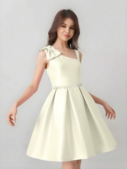 少女优雅时尚无袖高腰短款连衣裙，蝴蝶结和珍珠装饰，花童连衣裙，粉色