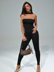 Denimoi Mono escotado y sin espalda con cuello de halter