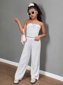 SHEIN Conjunto de 2 piezas de top de tirantes de color liso y pantalón largo informal para niñas preadolescentes