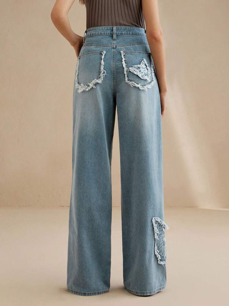 Women's Casual Long Denim Jeans With Unique Butterfly Embroidery And Frayed Hem Detail