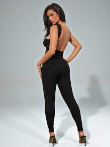 Denimoi Mono escotado y sin espalda con cuello de halter