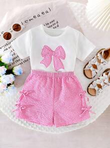 Conjunto informal de 2 piezas para niñas con camiseta de manga corta de cuello redondo a cuadros con lazo y shorts elásticos a la cintura con lazo a cuadros - Rosa - Ver 1