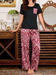 SHEIN Conjunto de pijama para mujer con estampado, de cuello redondo, manga corta y pantalón largo