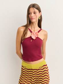 Nöista Ribbed Tank Top Features A Strap Design, A Teardrop Keyhole Cutout, And A Statement Orchid Embellishment. Stylish And Form-Fitting, It's Perfect For Summer Dates, Concerts, Or Adding Flair To Casual Looks.